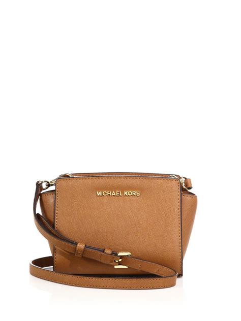 michael kors saffiano leather selma bag brown grommets|selma saffiano leather bag review.